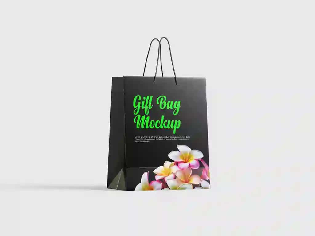 Gulli aksanlar bilan nafis sovg'a sumkasi maketi | Elegant gift bag mockup with floral accents